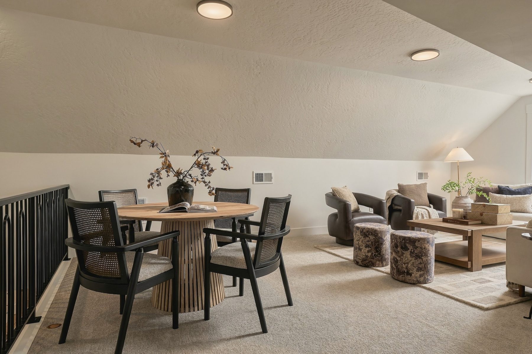 Upstairs bonus room with games table and lounge seating