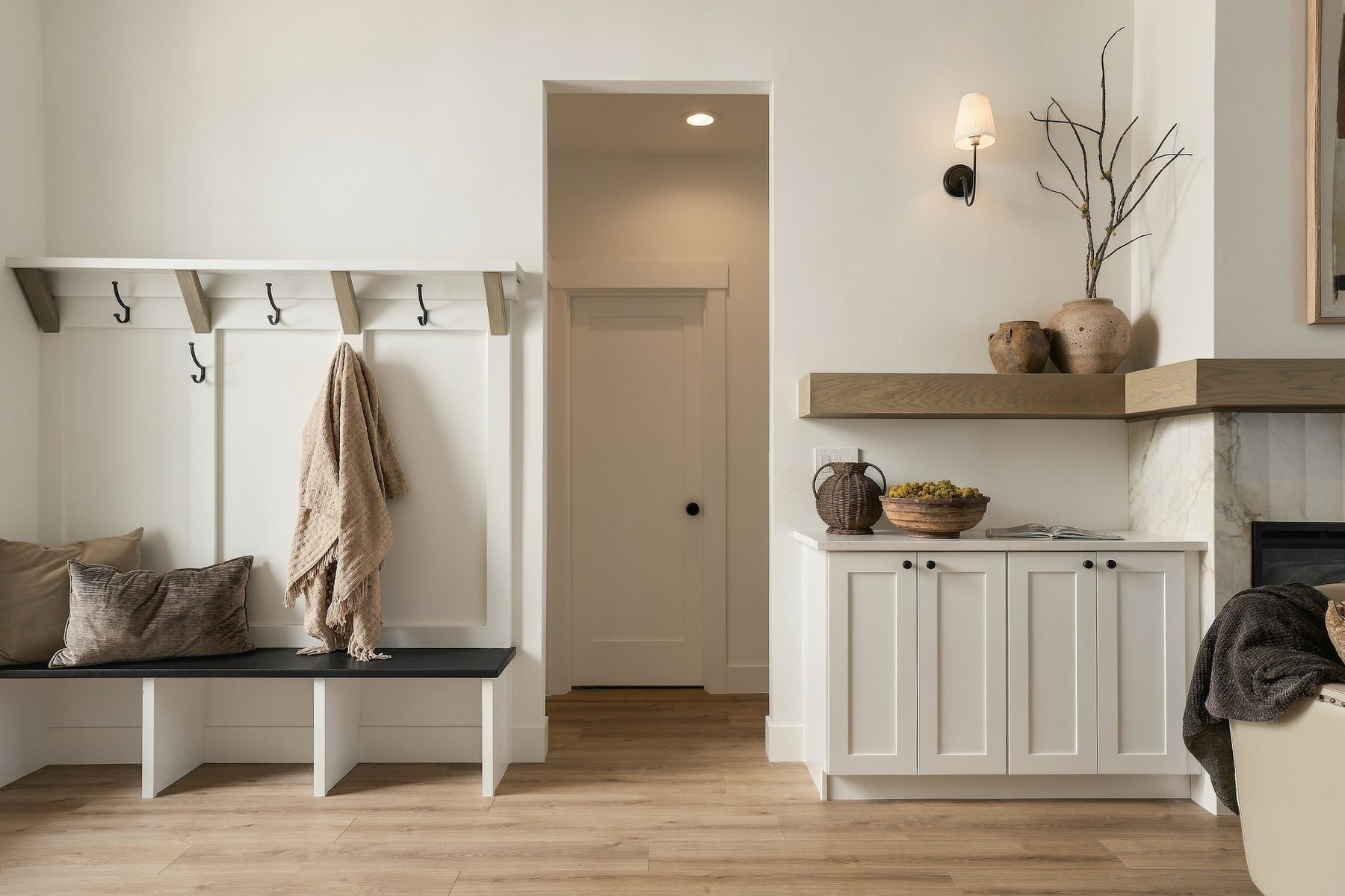 Mudroom lockers with bench seating and open hooks